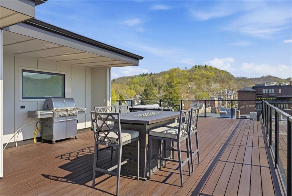 443 Walnut Street Sewickley, PA 15143 - Photo 42 of 50 Grill, dining, and open-air seating come together to make rooftop entertaining feel easy and complete. Plumbed for an outdoor kitchen.