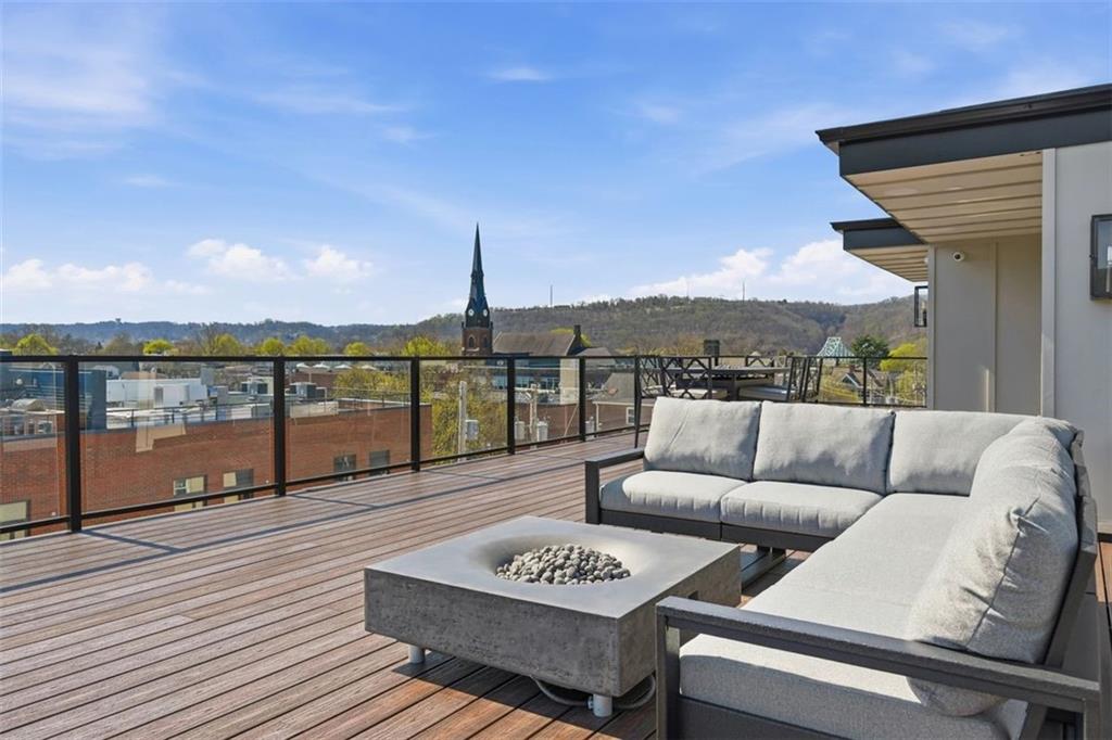 443 Walnut Street Sewickley, PA 15143 - Photo 45 of 50 Enjoy the custom tempered glass railings and roof deck hardwired outdoor audio.