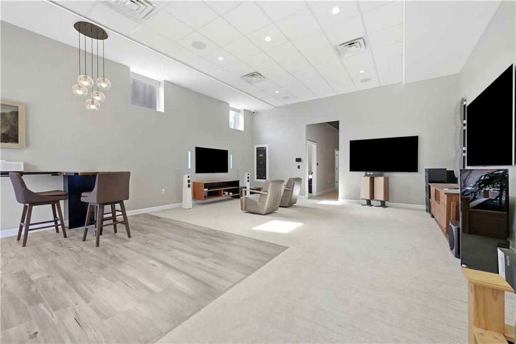 443 Walnut Street Sewickley, PA 15143 - Photo 48 of 50 This expansive front showroom is defined by soaring ceilings, oversized display walls, and a clean, open layout that gives the space a bright, gallery-like feel.