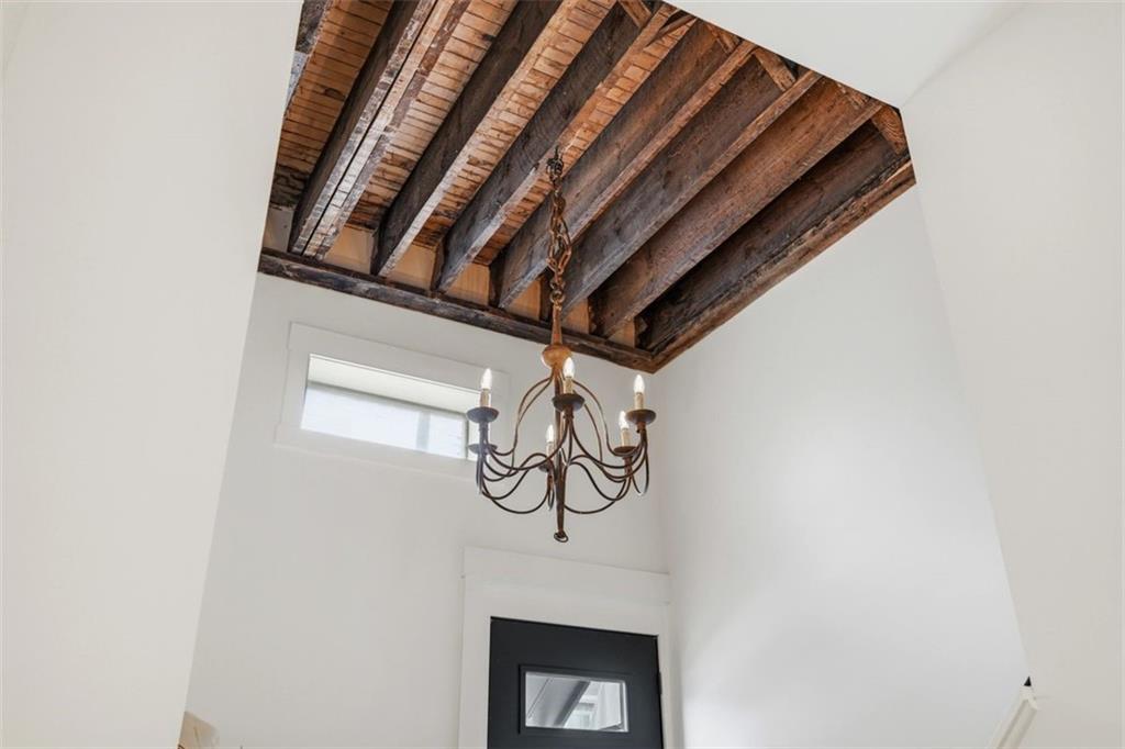 443 Walnut Street Sewickley, PA 15143 - Photo 8 of 50 Even the entry makes a design statement, with soaring height and original beams setting the tone for the home beyond.