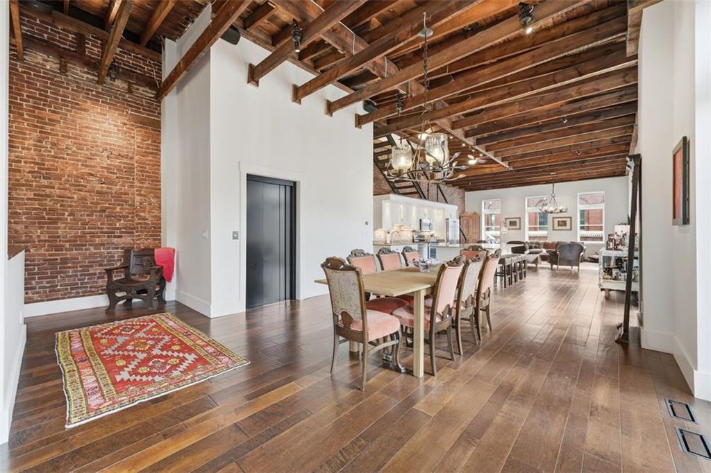 443 Walnut Street Sewickley, PA 15143 - Photo 10 of 50 Here, the full volume of the space comes into view — exposed brick, restored beams, and room to gather on a grand yet comfortable scale