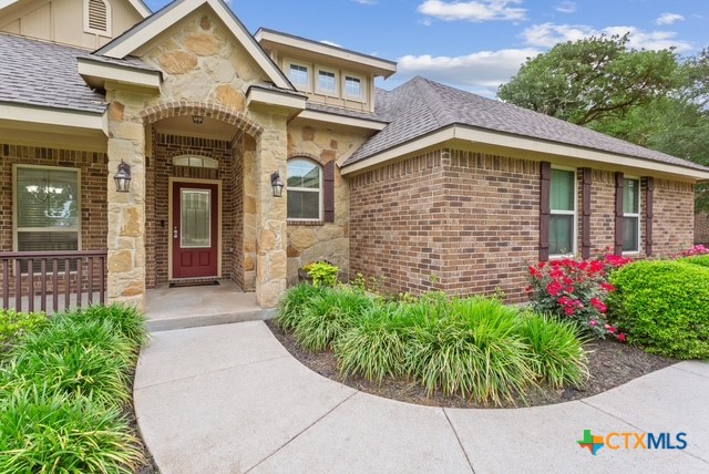 3306 Spring Canyon Road Belton, TX 76513 - Photo 4 of 40 a view of a house with potted plants