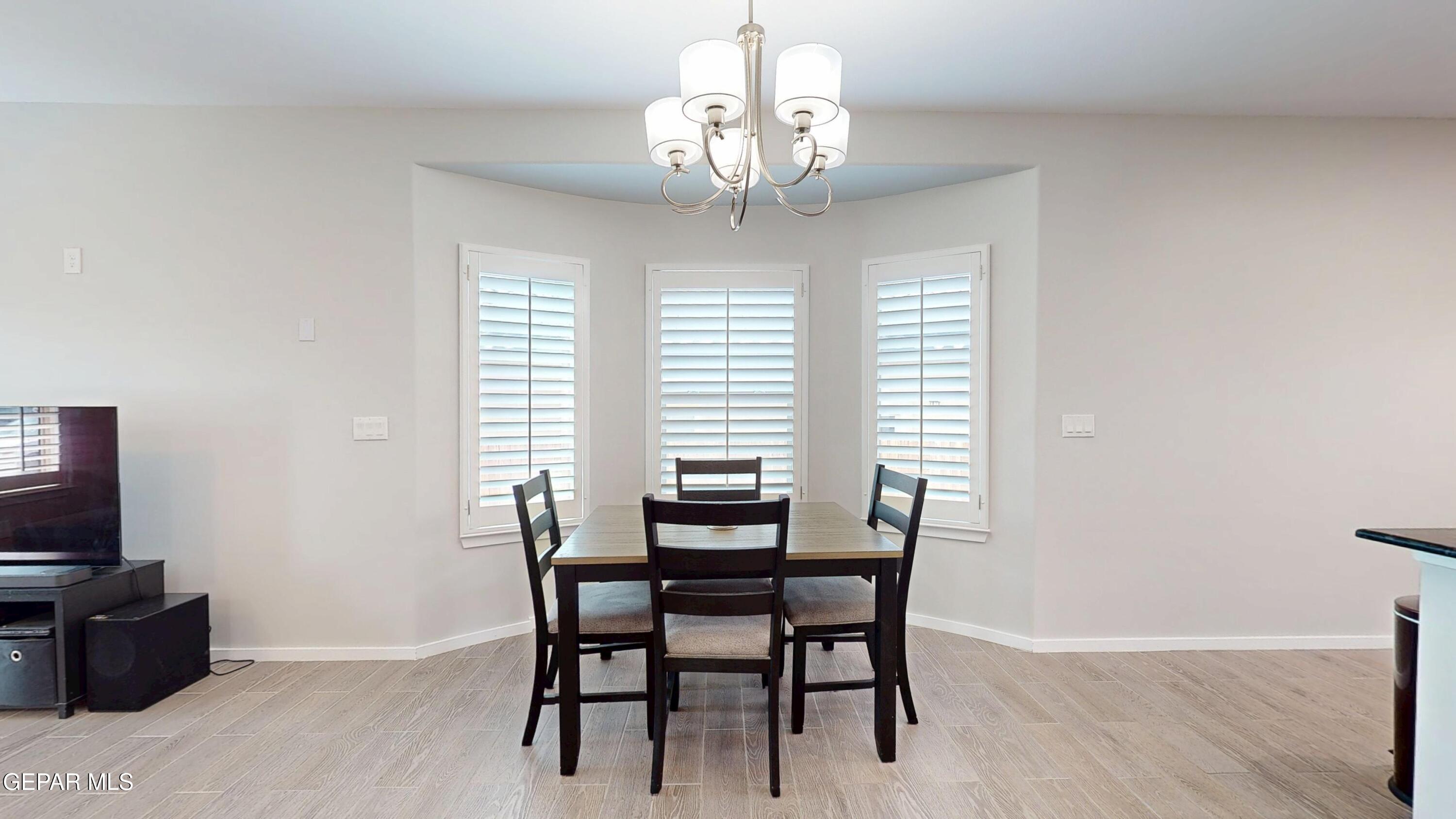 219 Notts Way El Paso, TX 79928 - Photo 13 of 35 a dining room with furniture and window