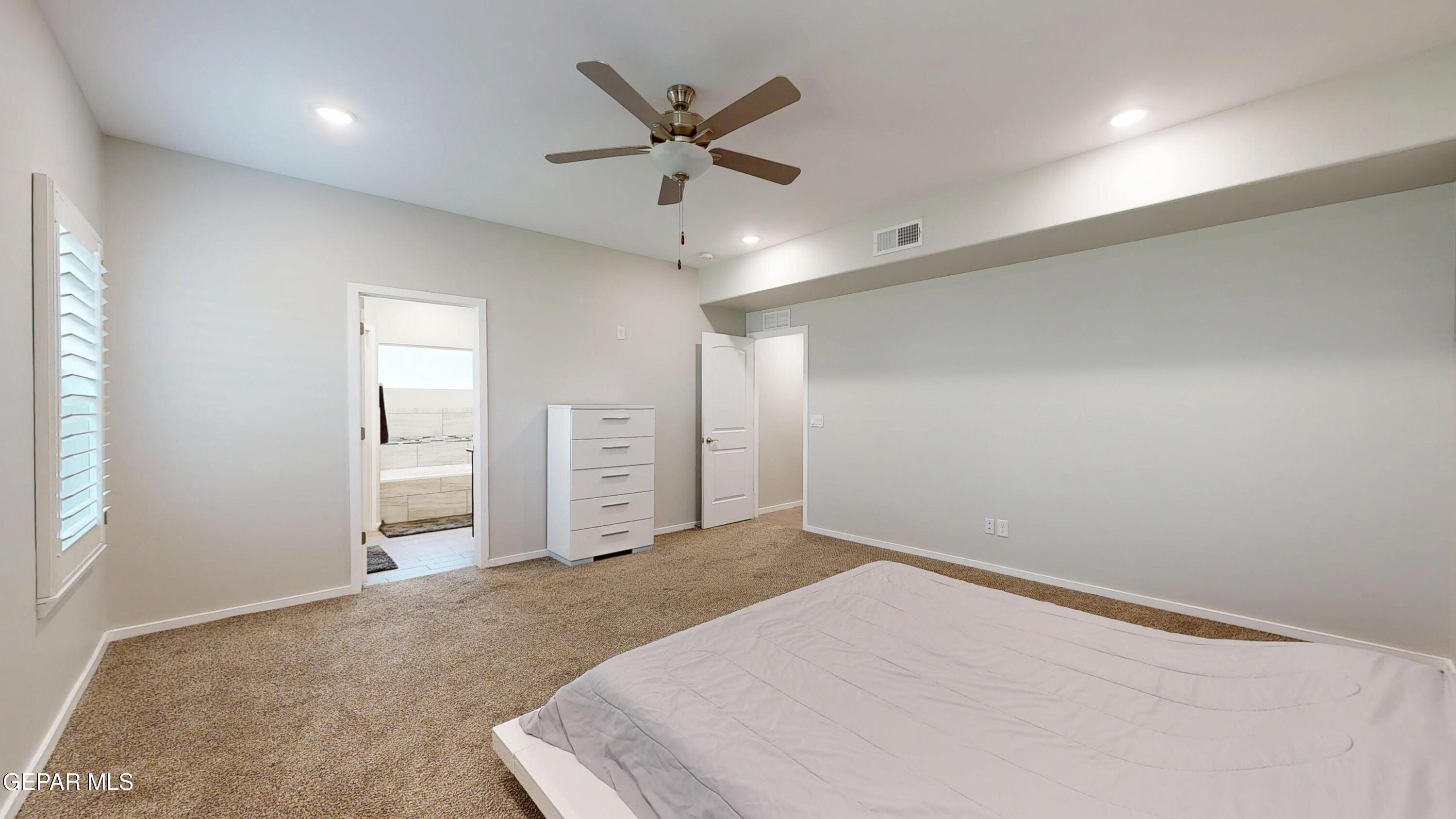 219 Notts Way El Paso, TX 79928 - Photo 17 of 35 an empty room with closet and fan