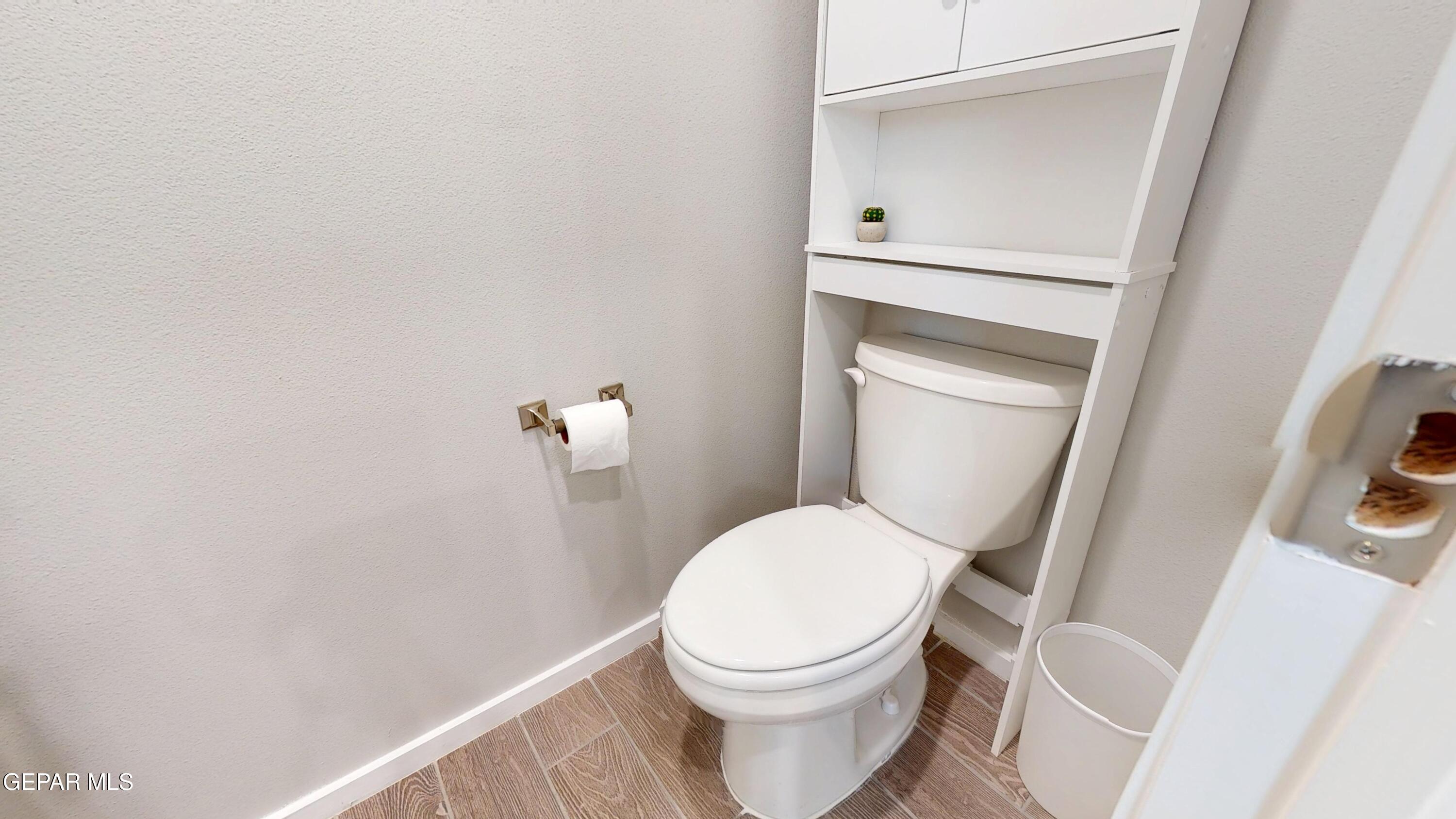 219 Notts Way El Paso, TX 79928 - Photo 23 of 35 a white toilet sitting next to a shower