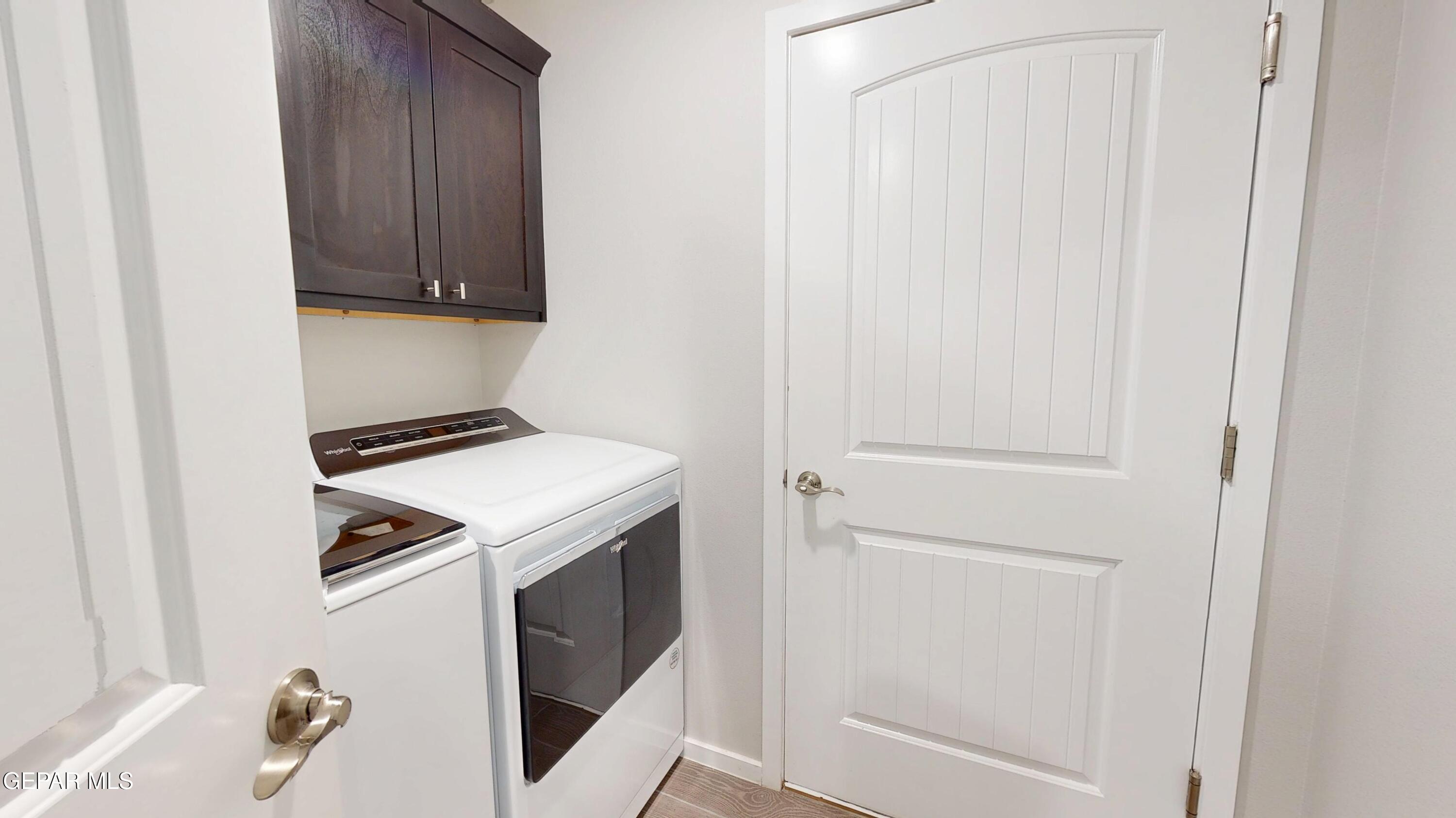 219 Notts Way El Paso, TX 79928 - Photo 24 of 35 a utility room with dryer and washer