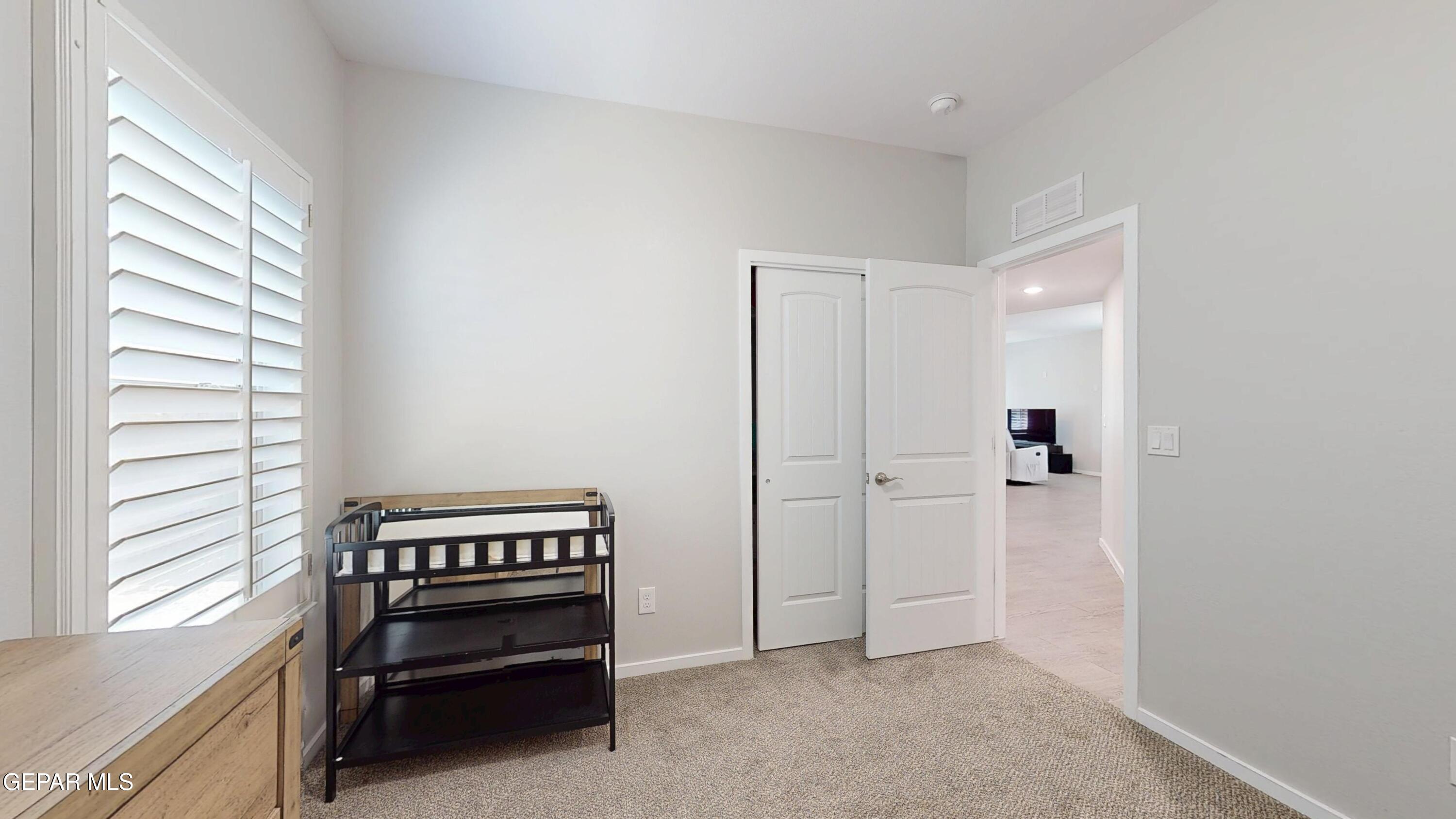 219 Notts Way El Paso, TX 79928 - Photo 30 of 35 a view of room with stairs and windows