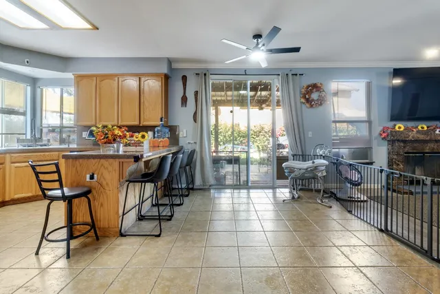 a kitchen with stainless steel appliances a sink and cabinets
