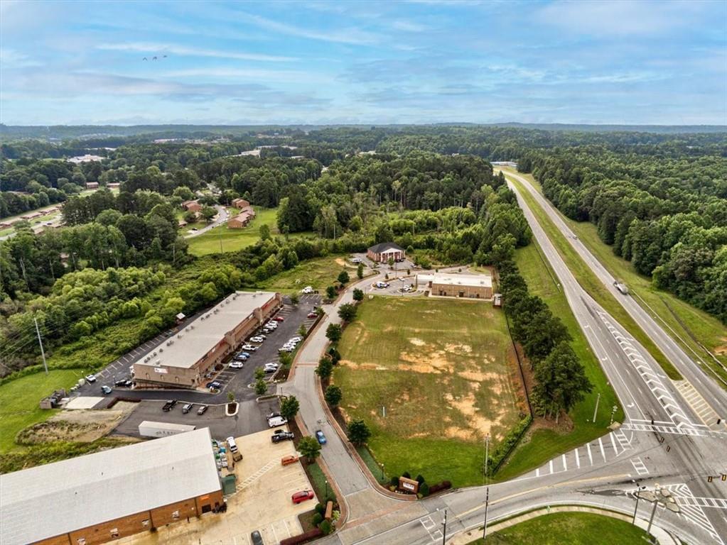 115 Village Walk Dallas, GA 30132 - Photo 6 of 16 an aerial view of residential houses with outdoor space