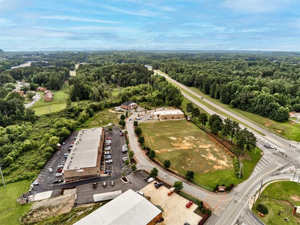 115 Village Walk Dallas, GA 30132 - Photo 7 of 16 an aerial view of a residential houses with outdoor space and trees