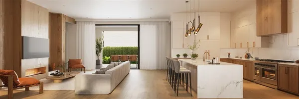 a living room with kitchen island furniture a sink a flat screen tv and a window