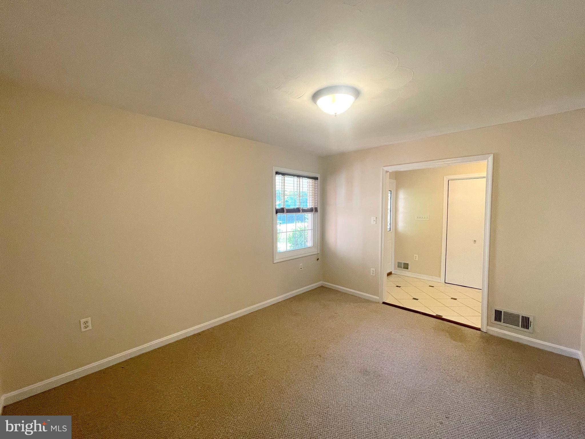 11717 Rivershore Drive Dunkirk, MD 20754 - Photo 11 of 49 an empty room with a empty space and window