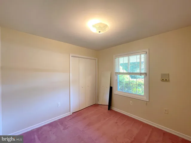 an empty room with closet