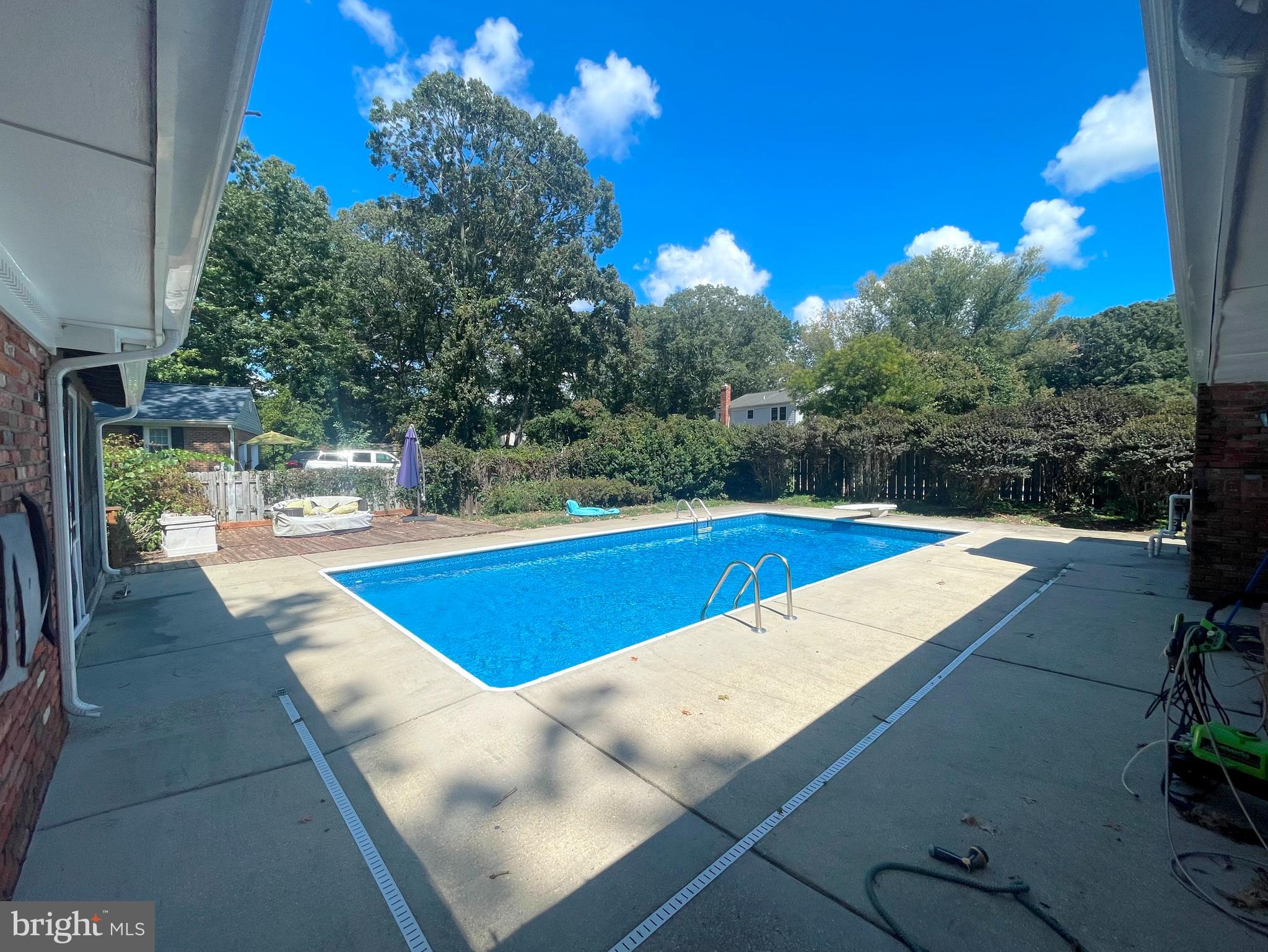 11717 Rivershore Drive Dunkirk, MD 20754 - Photo 36 of 49 a view of a swimming pool with an outdoor seating