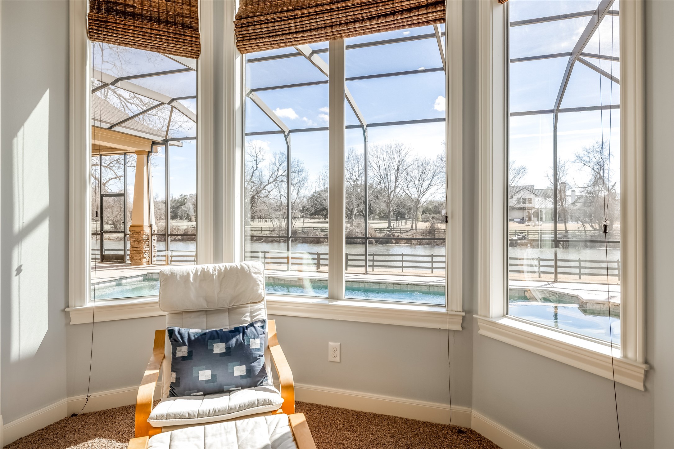 31102 Lower Oxbow Trace Fulshear, TX 77441 - Photo 21 of 50 Enjoy the peaceful, beautiful views out to the pool & Oxbow Lake