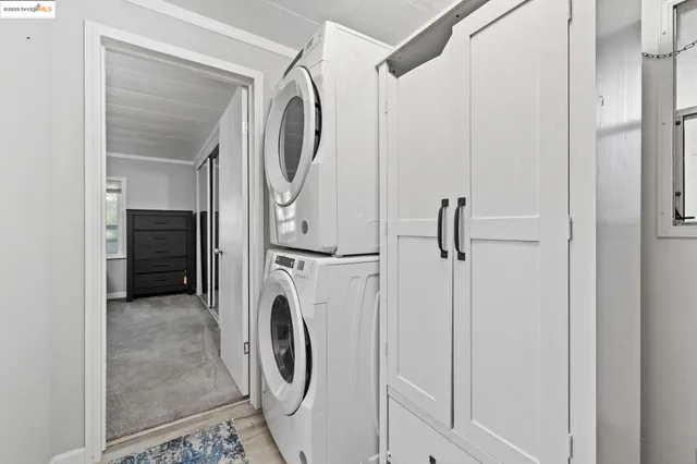 a view of a storage & utility room with washer and dryer
