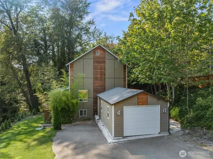 a backyard of a house with lots of green space