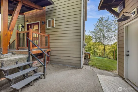 a view of a house with a small yard