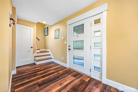 a bedroom with a bed and a view of bathroom