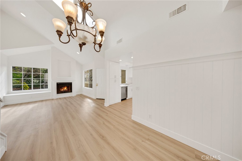 21146 Sunny Ridge Lake Forest, CA 92630 - Photo 14 of 43 a view of a livingroom with wooden floor and a large window