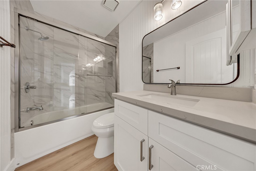 21146 Sunny Ridge Lake Forest, CA 92630 - Photo 27 of 43 a bathroom with a double vanity sink toilet and shower