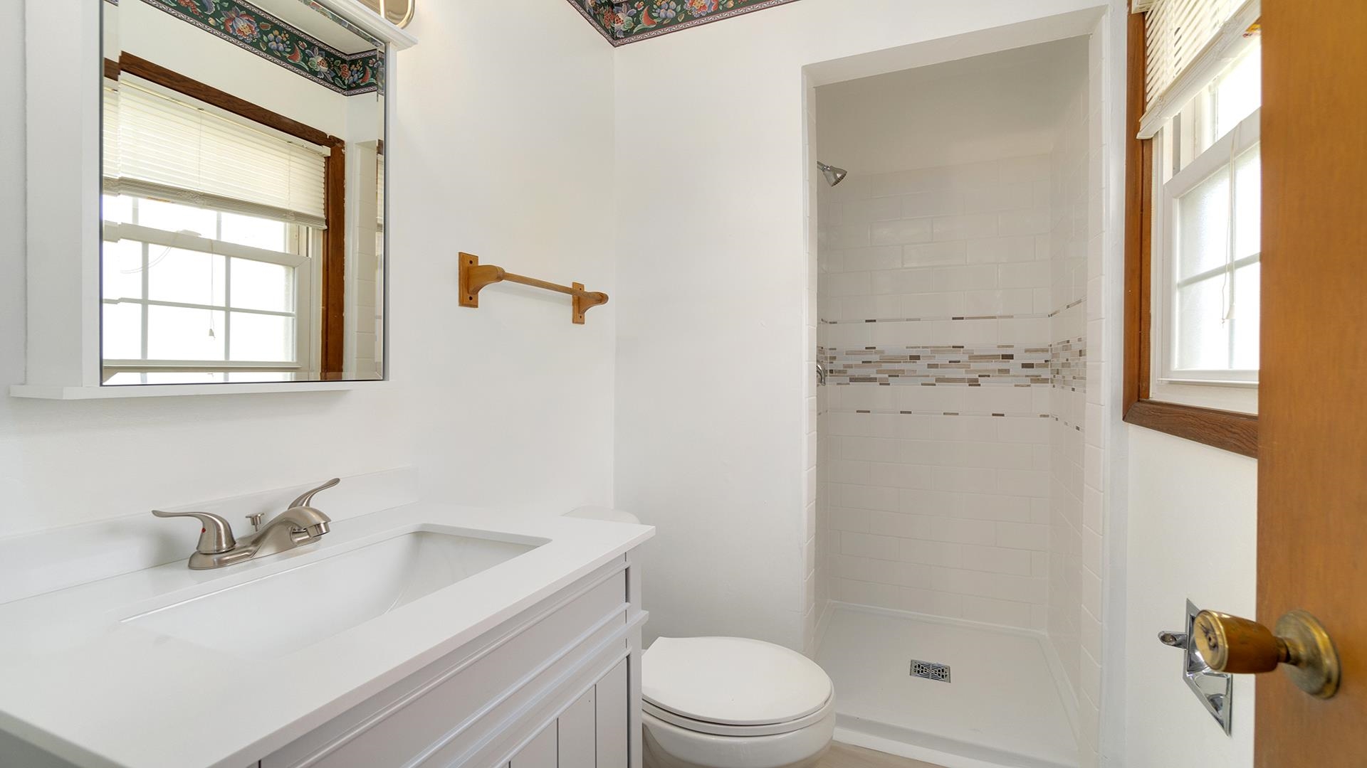 345 Irene Avenue Rochelle, IL 61068 - Photo 12 of 27 a bathroom with a granite countertop sink toilet and shower