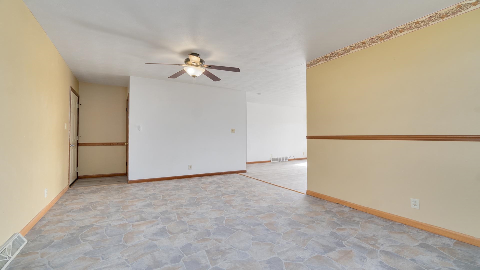 345 Irene Avenue Rochelle, IL 61068 - Photo 14 of 27 a view of a big room with carpet