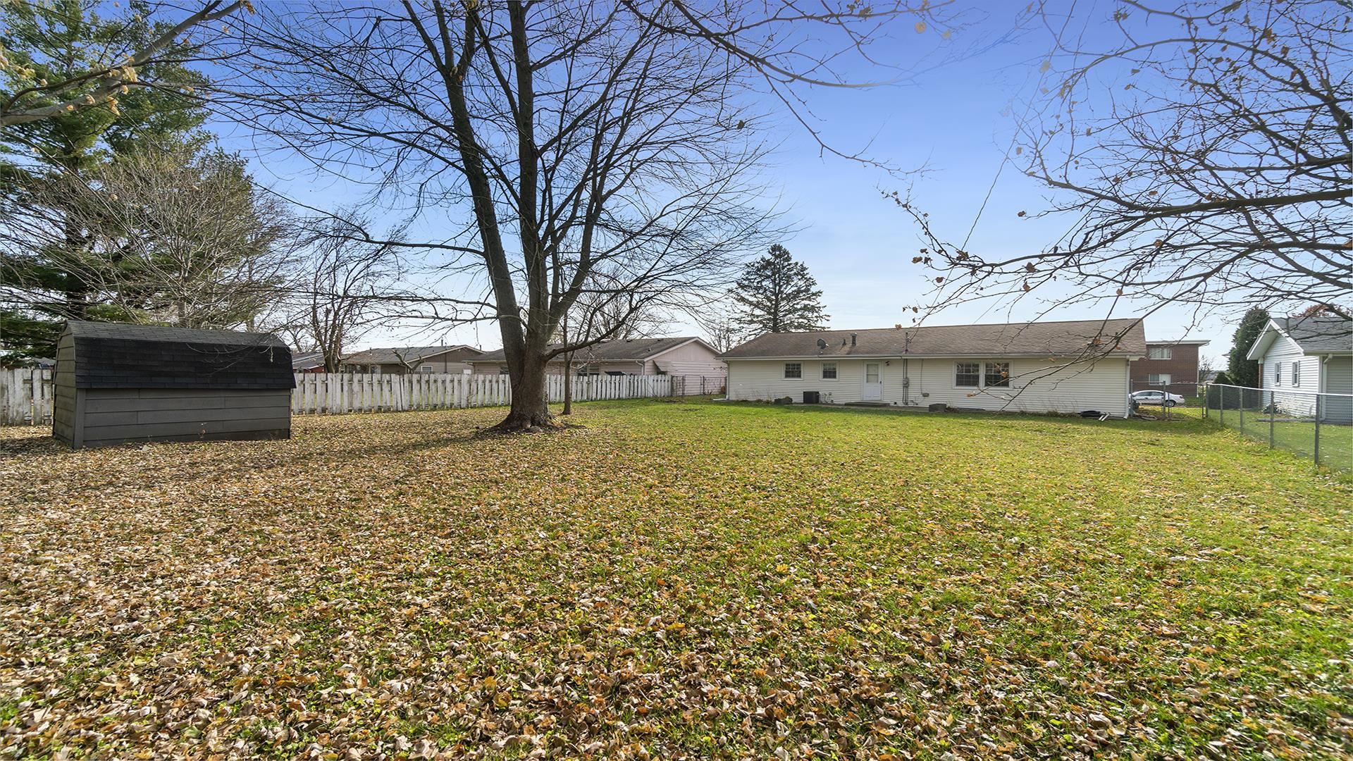 345 Irene Avenue Rochelle, IL 61068 - Photo 24 of 27 a view of a house with a yard
