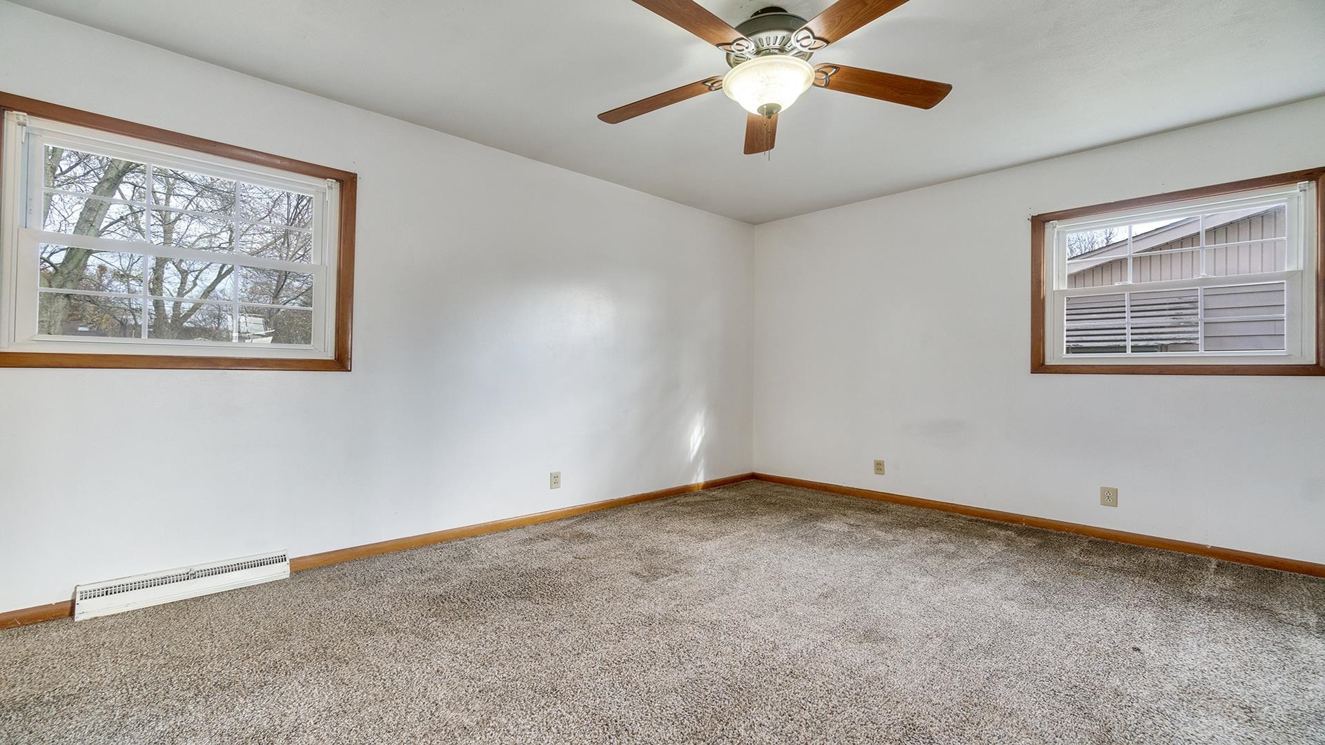 345 Irene Avenue Rochelle, IL 61068 - Photo 10 of 27 a view of an empty room with a window