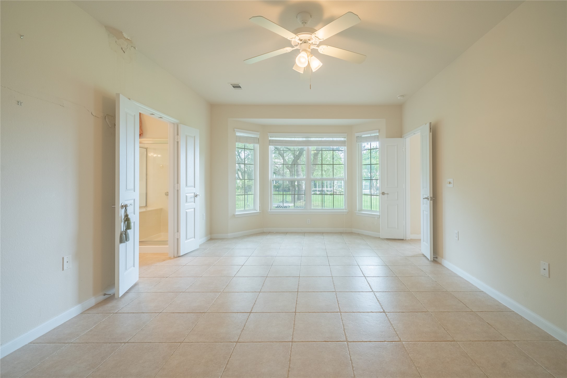 311 Deer Meadow Circle Georgetown, TX 78633 - Photo 13 of 19 a view of an empty room with a window