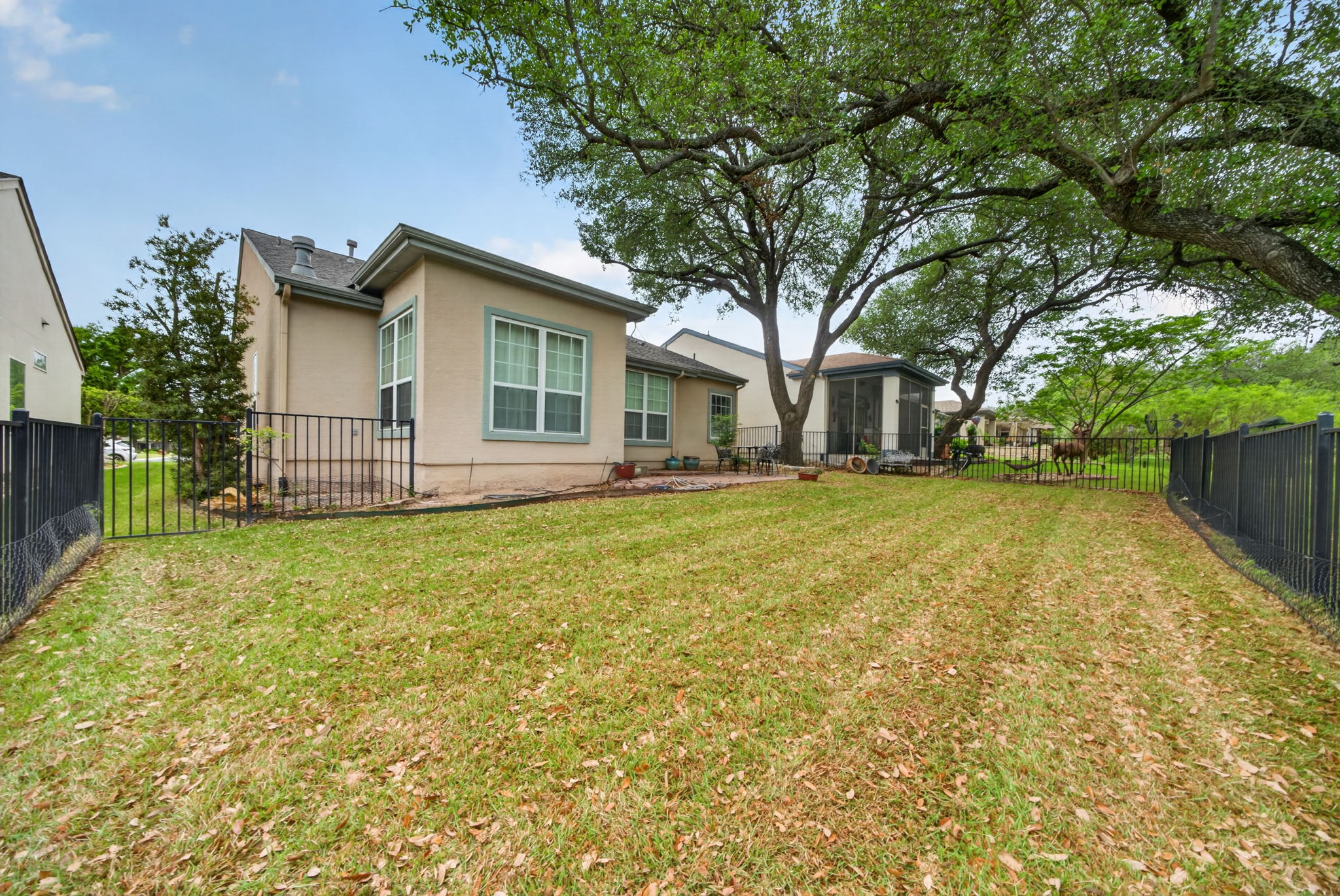 311 Deer Meadow Circle Georgetown, TX 78633 - Photo 17 of 19 a front view of house with yard and green space
