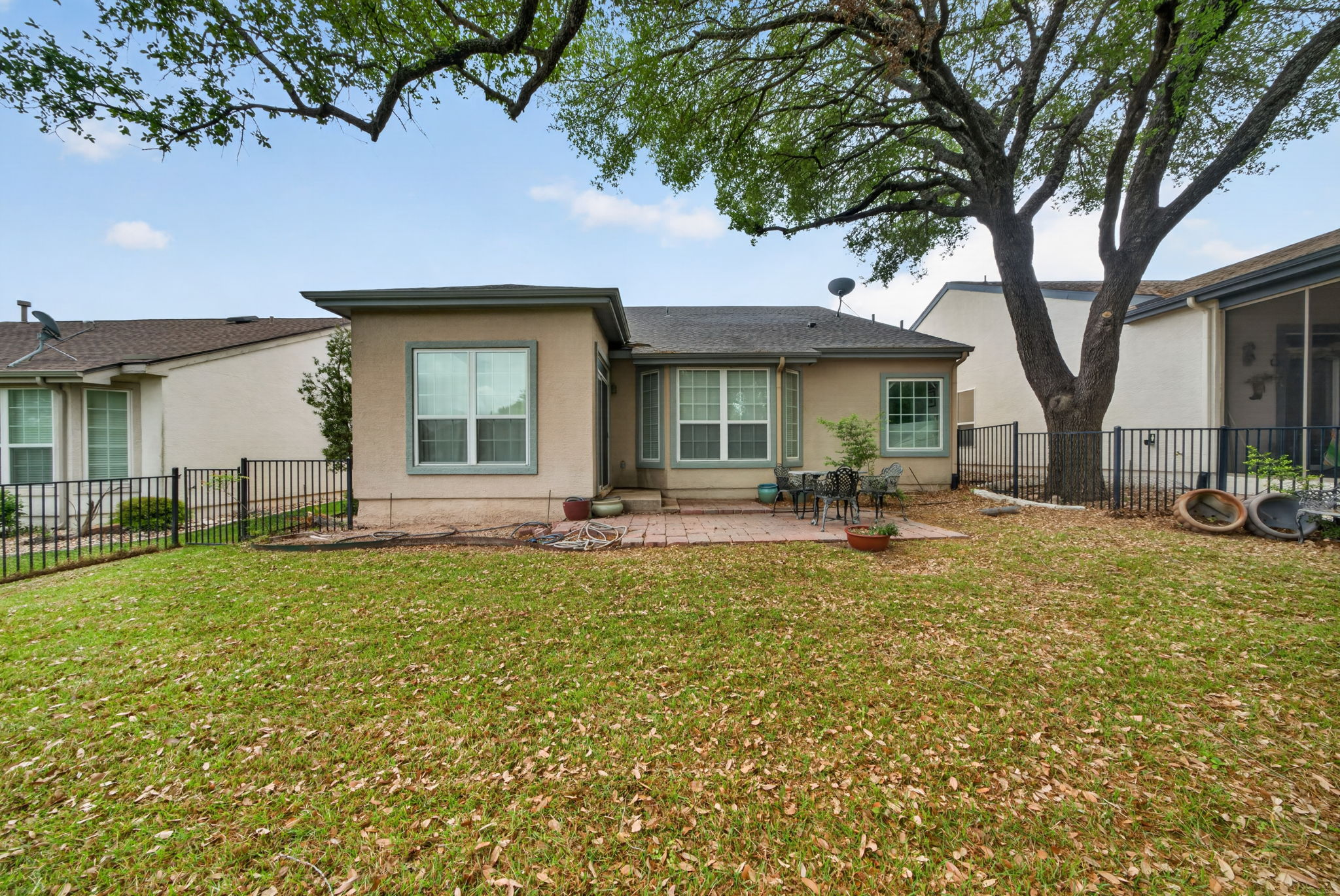 311 Deer Meadow Circle Georgetown, TX 78633 - Photo 18 of 19 a view of a house with backyard and sitting area