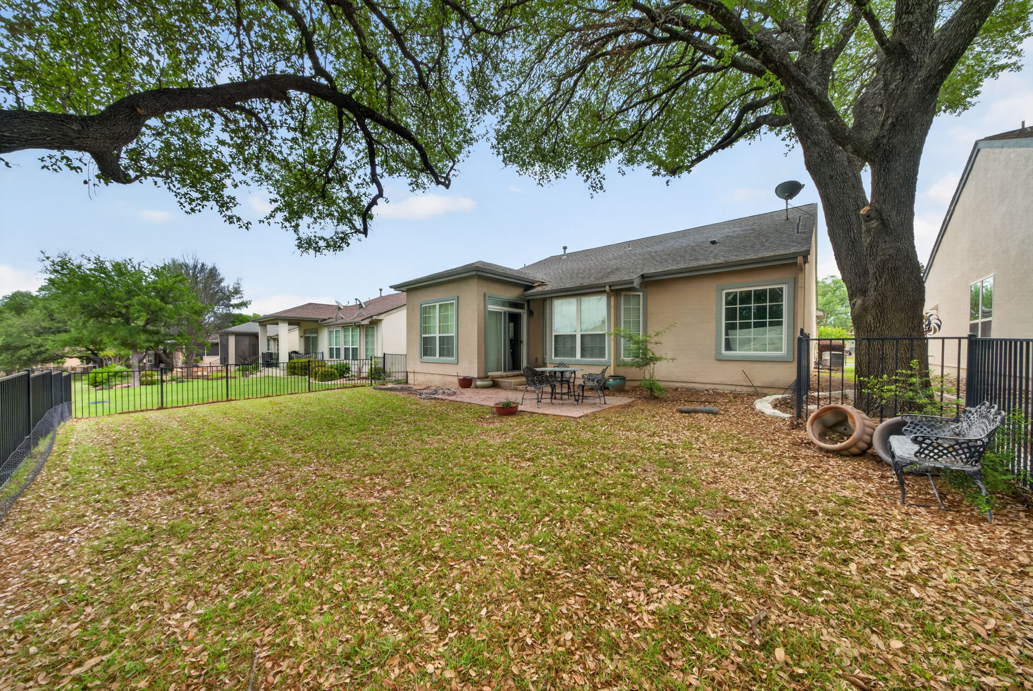 311 Deer Meadow Circle Georgetown, TX 78633 - Photo 19 of 19 a front view of a house with garden