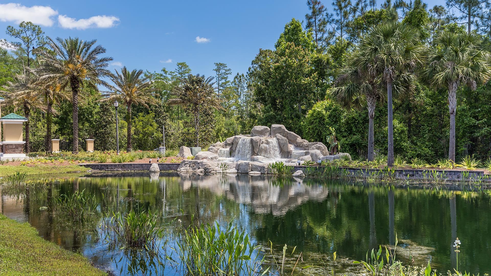 681 Grand Reserve Drive Bunnell, FL 32110 - Photo 5 of 26 a swimming pool with outdoor seating and yard