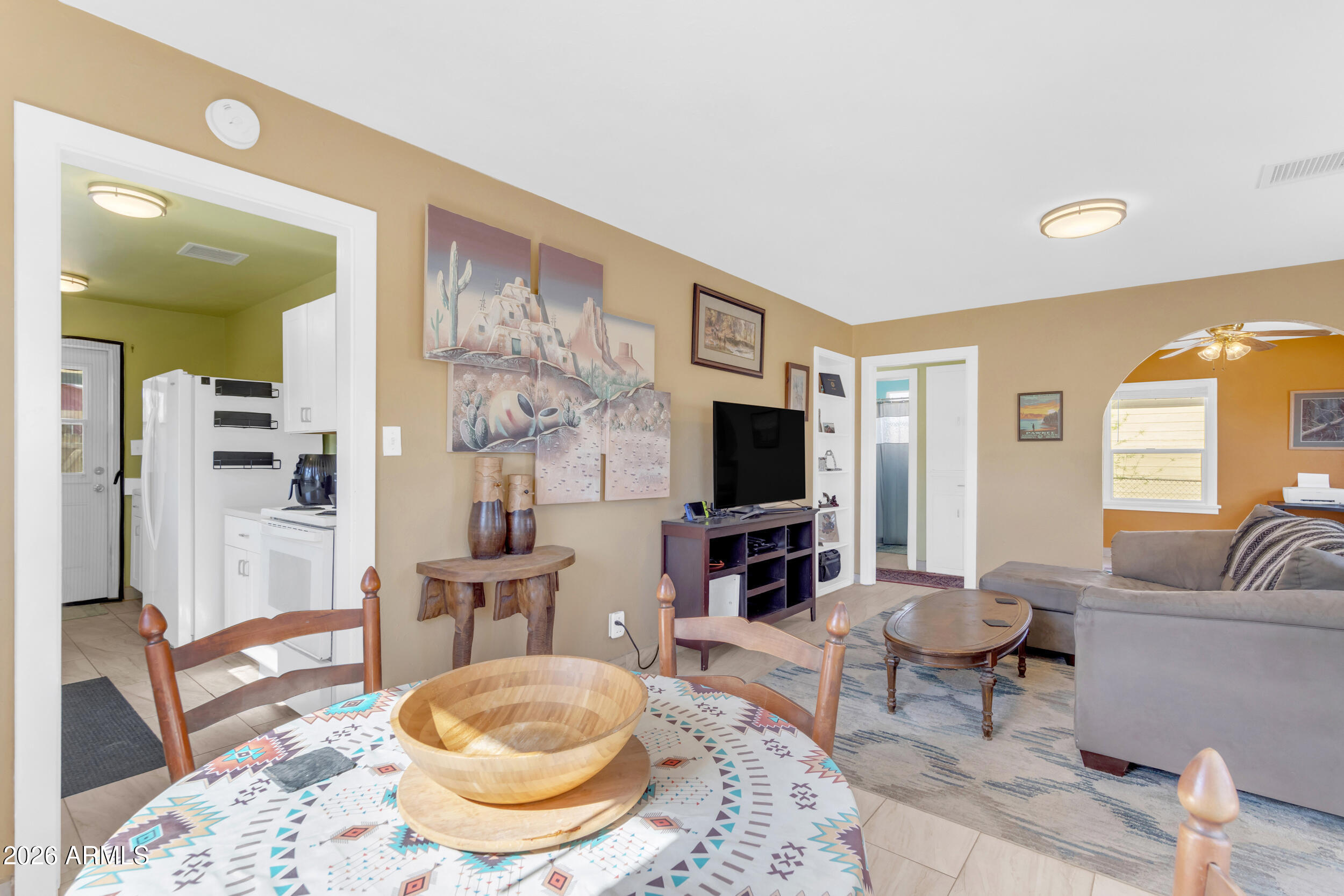 321 Solana Avenue Ajo, AZ 85321 - Photo 6 of 20 a living room with furniture and a flat screen tv