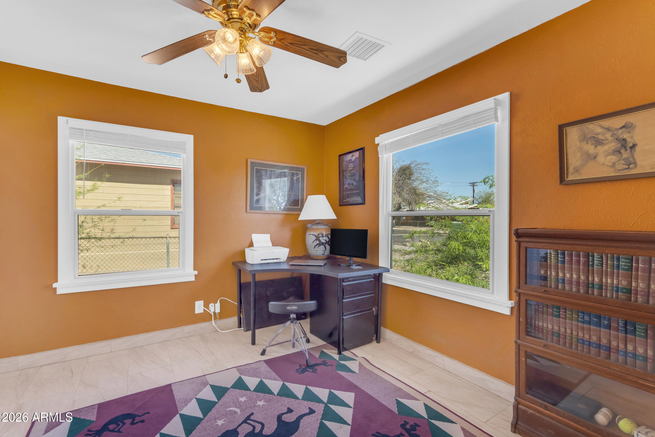 321 Solana Avenue Ajo, AZ 85321 - Photo 8 of 20 a living room with furniture and a window
