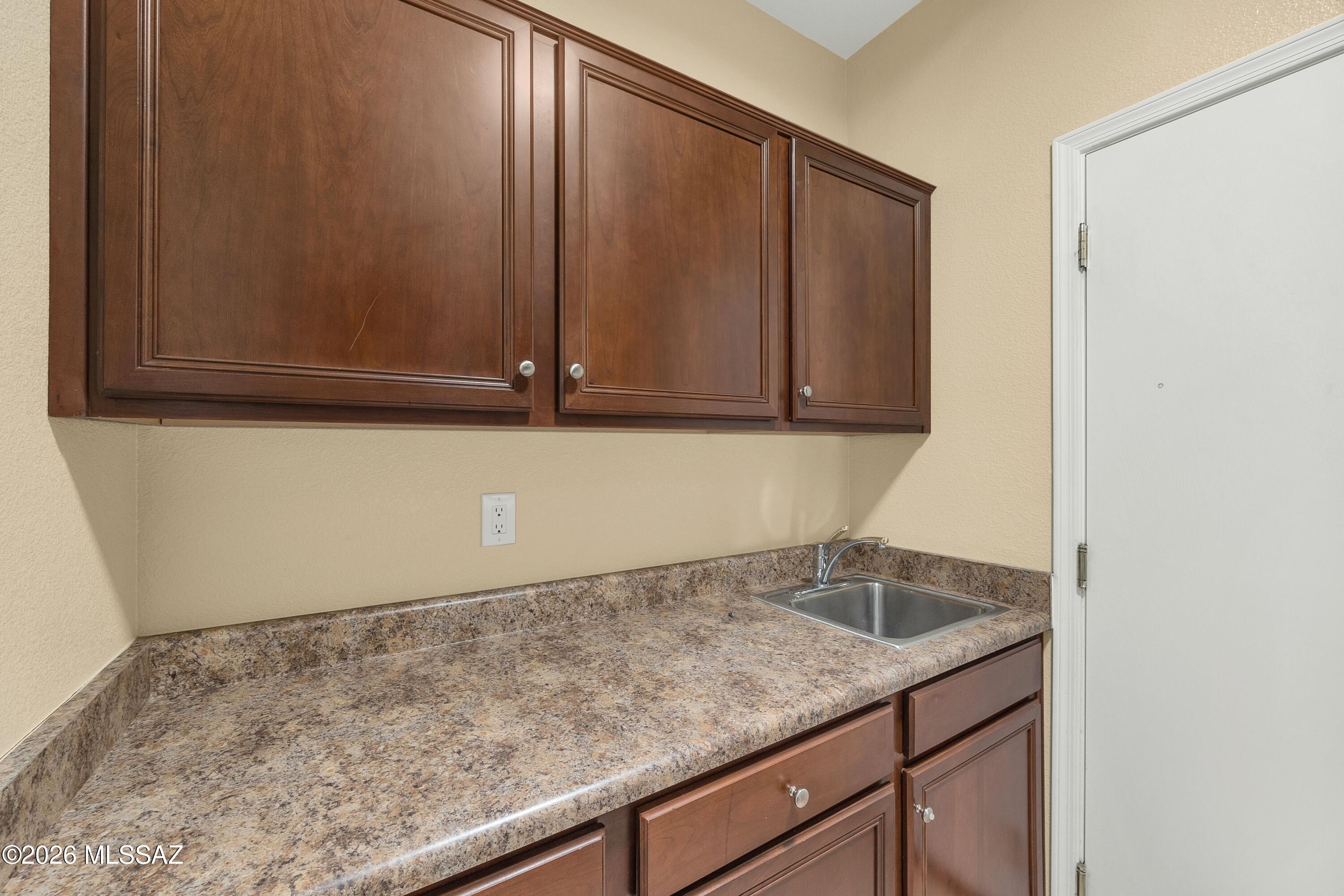 62090 East Northwood Road Tucson, AZ 85739 - Photo 36 of 49 Convenient Cabinets & Sink
