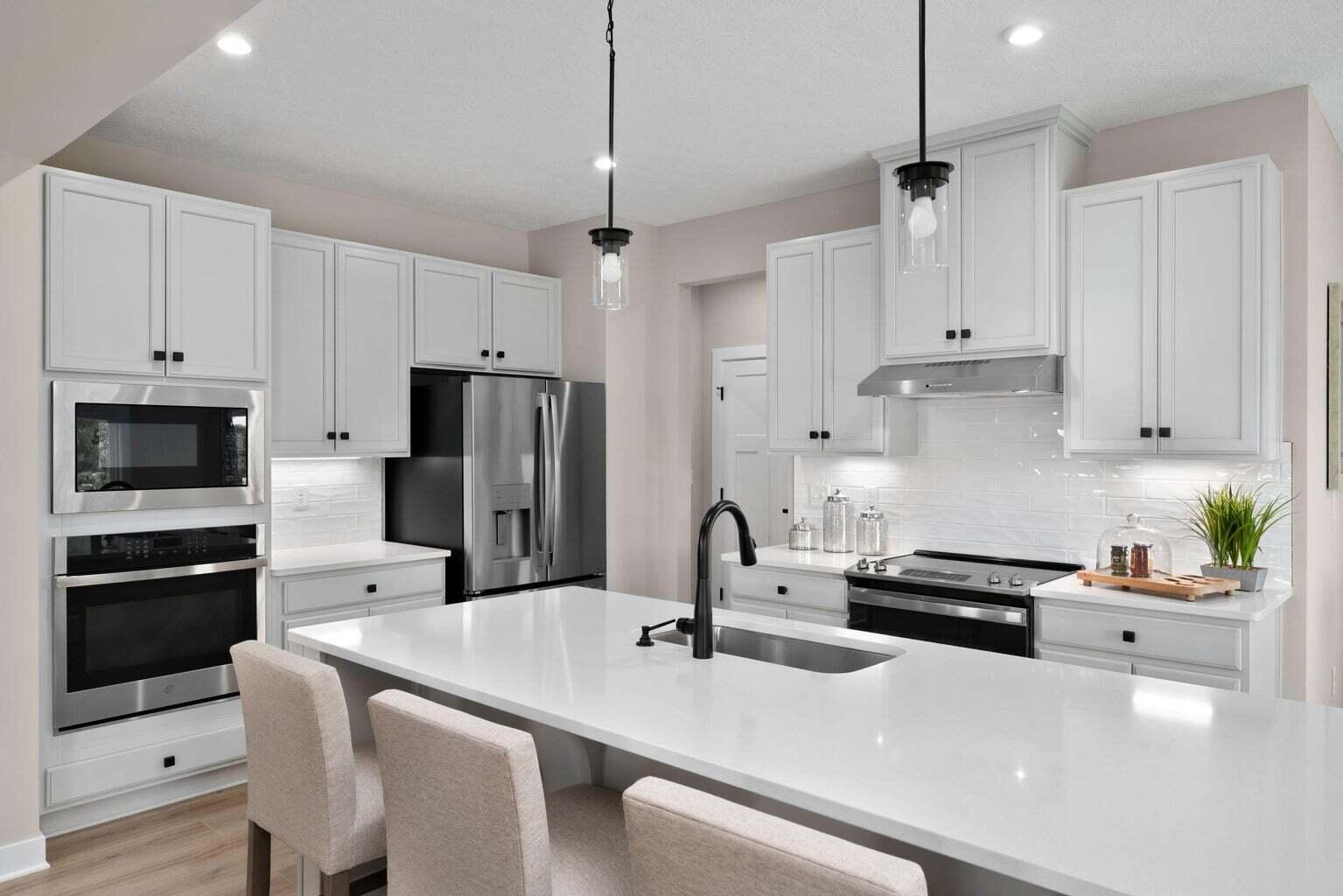 7243 Fairway Rdg Circle Salem, VA 24153 - Photo 6 of 14 a kitchen with stainless steel appliances a stove a sink a microwave and cabinets