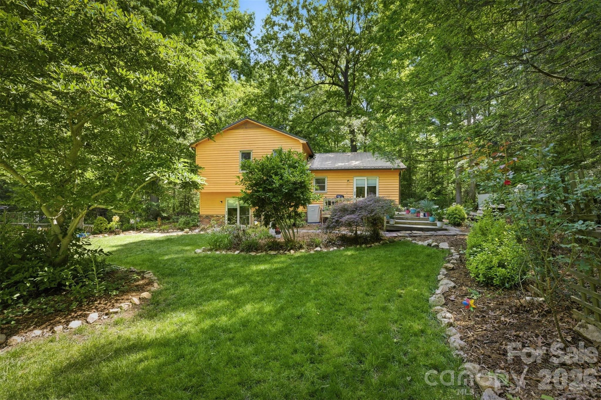 3432 Ridgewood Drive Morganton, NC 28655 - Photo 36 of 36 a view of a house with a backyard