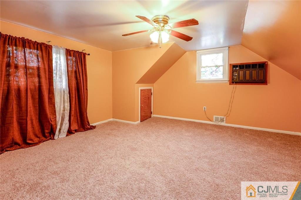 16 Stockton Road New Brunswick, NJ 08901 - Photo 19 of 25 a view of an empty room with a window