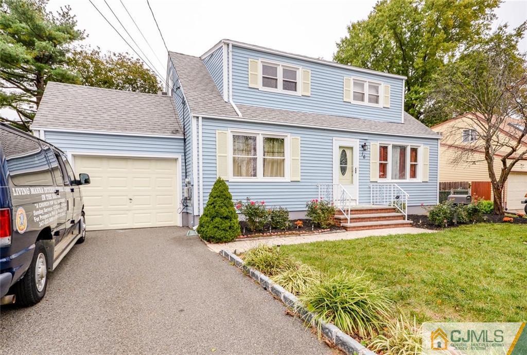 16 Stockton Road New Brunswick, NJ 08901 - Photo 24 of 25 a front view of a house with yard and garage