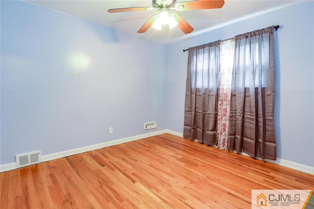 16 Stockton Road New Brunswick, NJ 08901 - Photo 10 of 25 a view of an empty room with a window