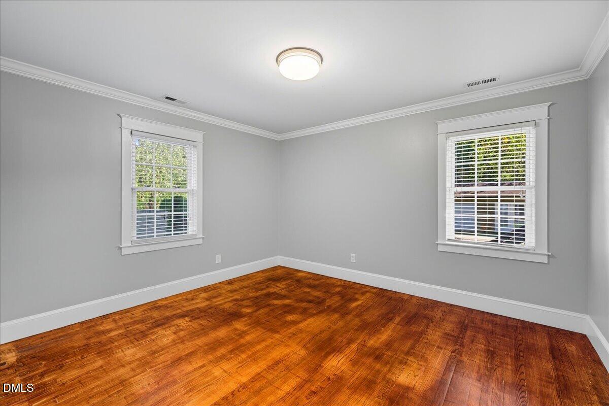 709 Winterlochen Road Raleigh, NC 27603 - Photo 24 of 52 a view of an empty room with a window
