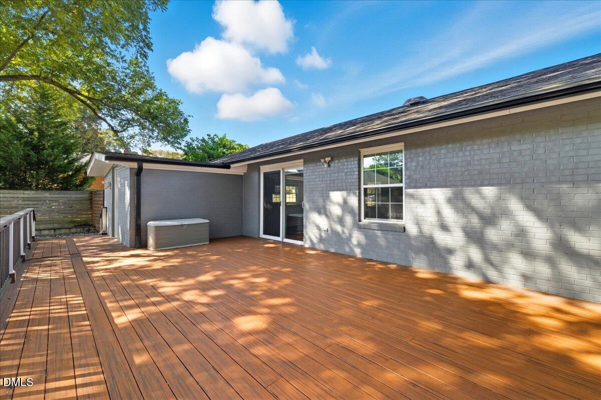 709 Winterlochen Road Raleigh, NC 27603 - Photo 31 of 52 a view of a house with a yard