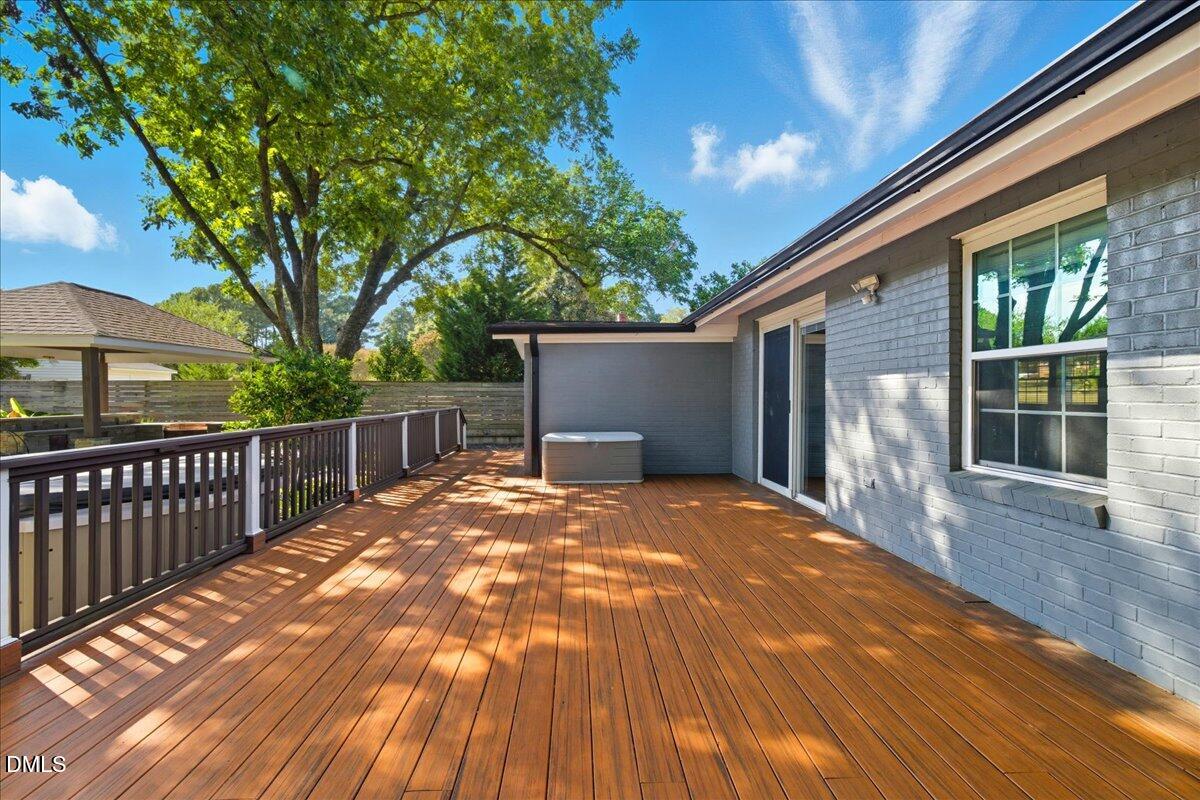 709 Winterlochen Road Raleigh, NC 27603 - Photo 32 of 52 a view of backyard with green space