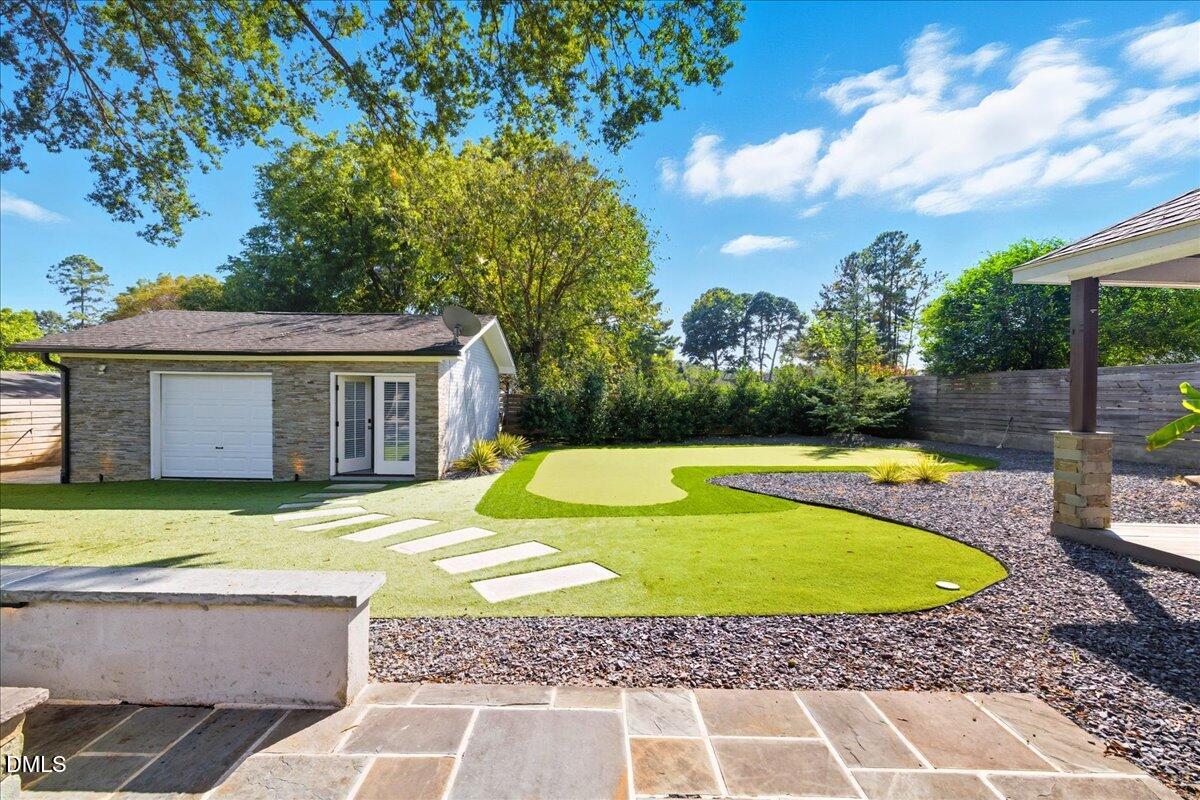 709 Winterlochen Road Raleigh, NC 27603 - Photo 40 of 52 a view of a house with a swimming pool