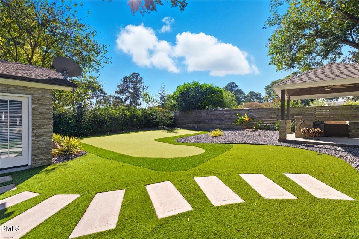 709 Winterlochen Road Raleigh, NC 27603 - Photo 41 of 52 a view of swimming pool and outdoor seating
