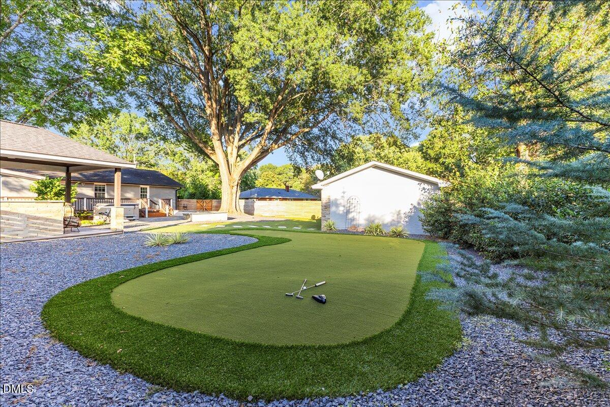 709 Winterlochen Road Raleigh, NC 27603 - Photo 43 of 52 a view of outdoor space and tree