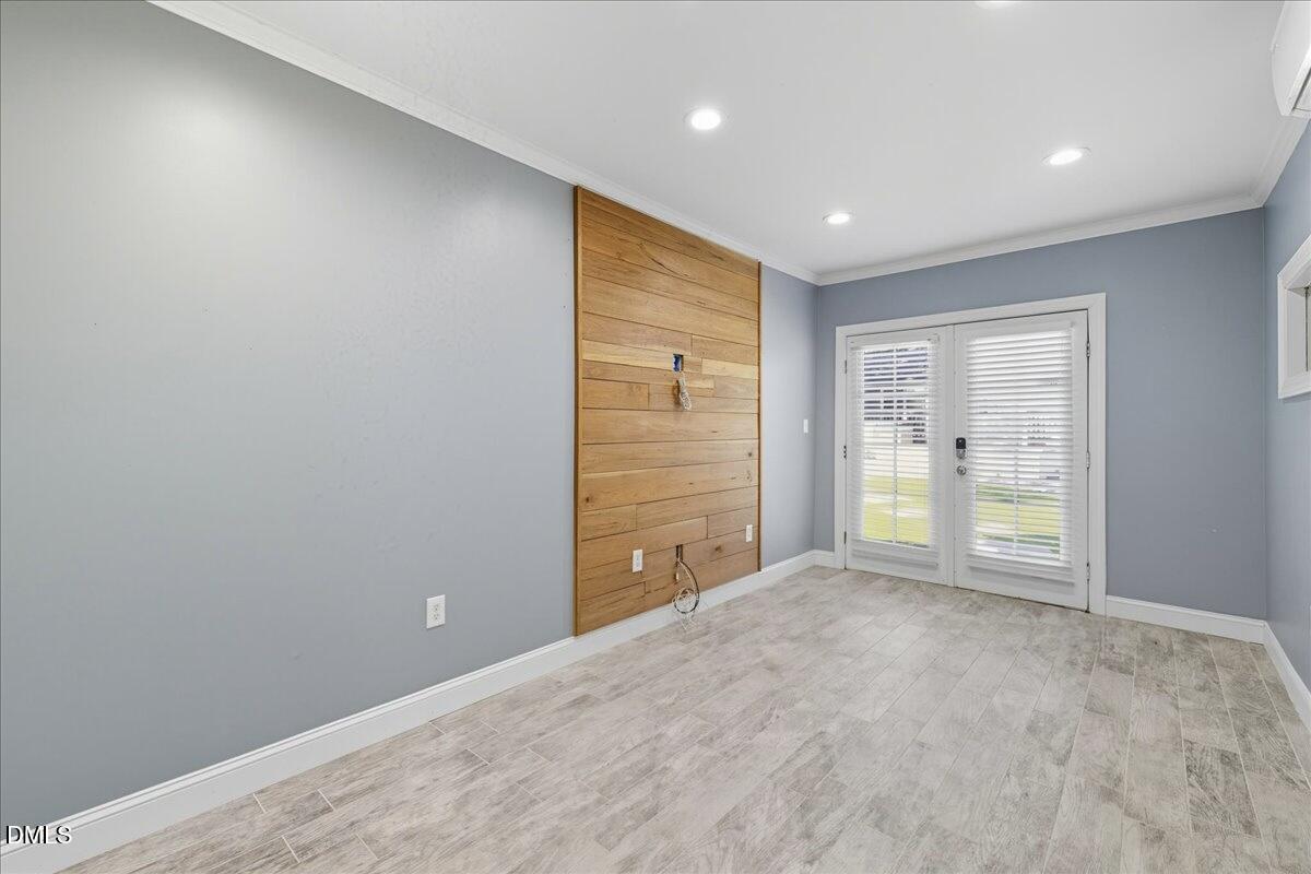 709 Winterlochen Road Raleigh, NC 27603 - Photo 51 of 52 a view of an empty room with a window