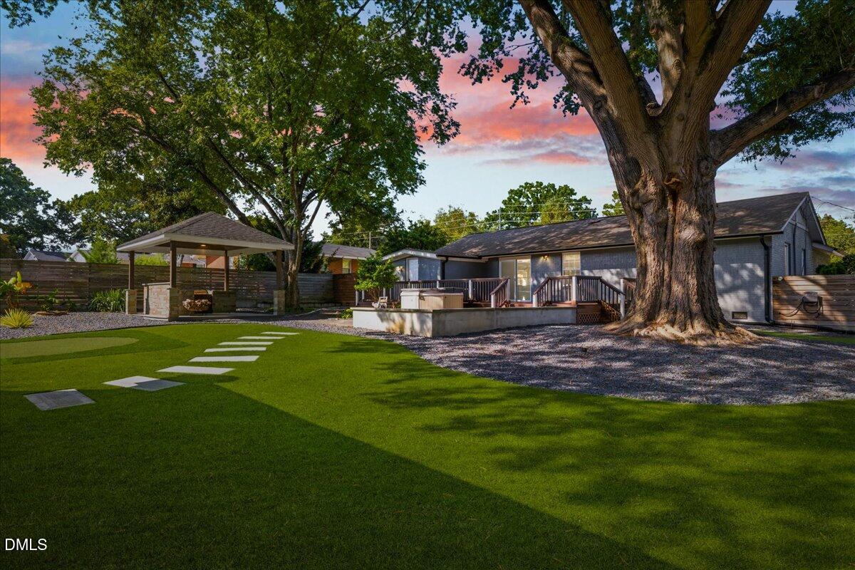 709 Winterlochen Road Raleigh, NC 27603 - Photo 52 of 52 a front view of a house with a garden